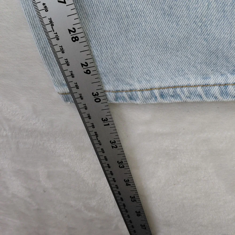 Vintage Levis 550 Relaxed Fit Light Wash Jeans Mens 40x30 Made in USA Blue
